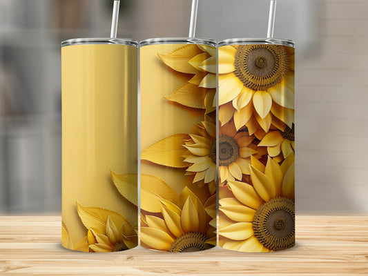 Three yellow tumblers with sunflowers and leaves on a wooden surface.