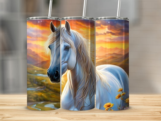 White horse with flowing mane against sunset landscape on three tumblers.