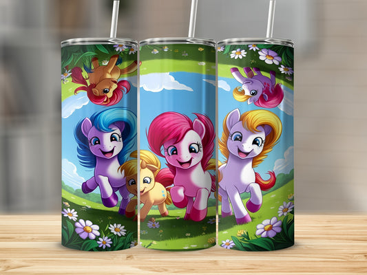 Three My Little Pony tumblers with colorful ponies and flowers against a grassy background.