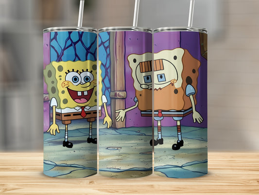 SpongeBob SquarePants character tumbler with straw on wooden surface.