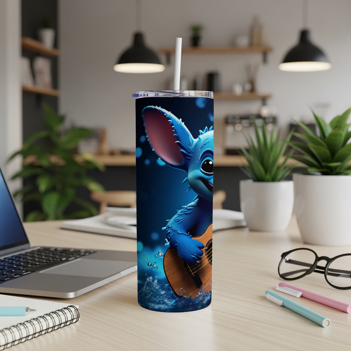 Blue cartoon character playing guitar on a tumbler.