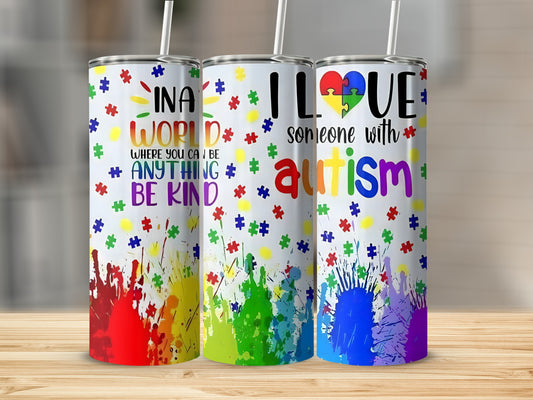 Three tumblers with "In a world where you can be anything be kind" and "I love someone with autism."