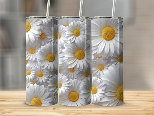 Three tumblers with a repeating pattern of white daisies and yellow centers.