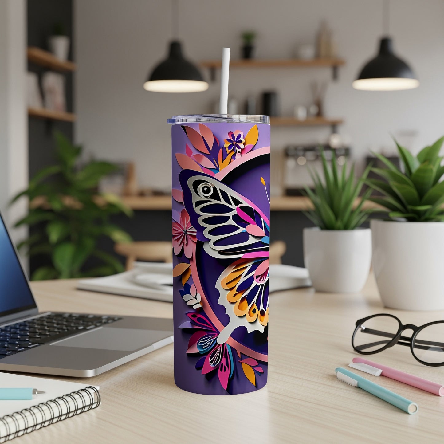 Purple tumbler with a colorful butterfly and floral paper craft design.