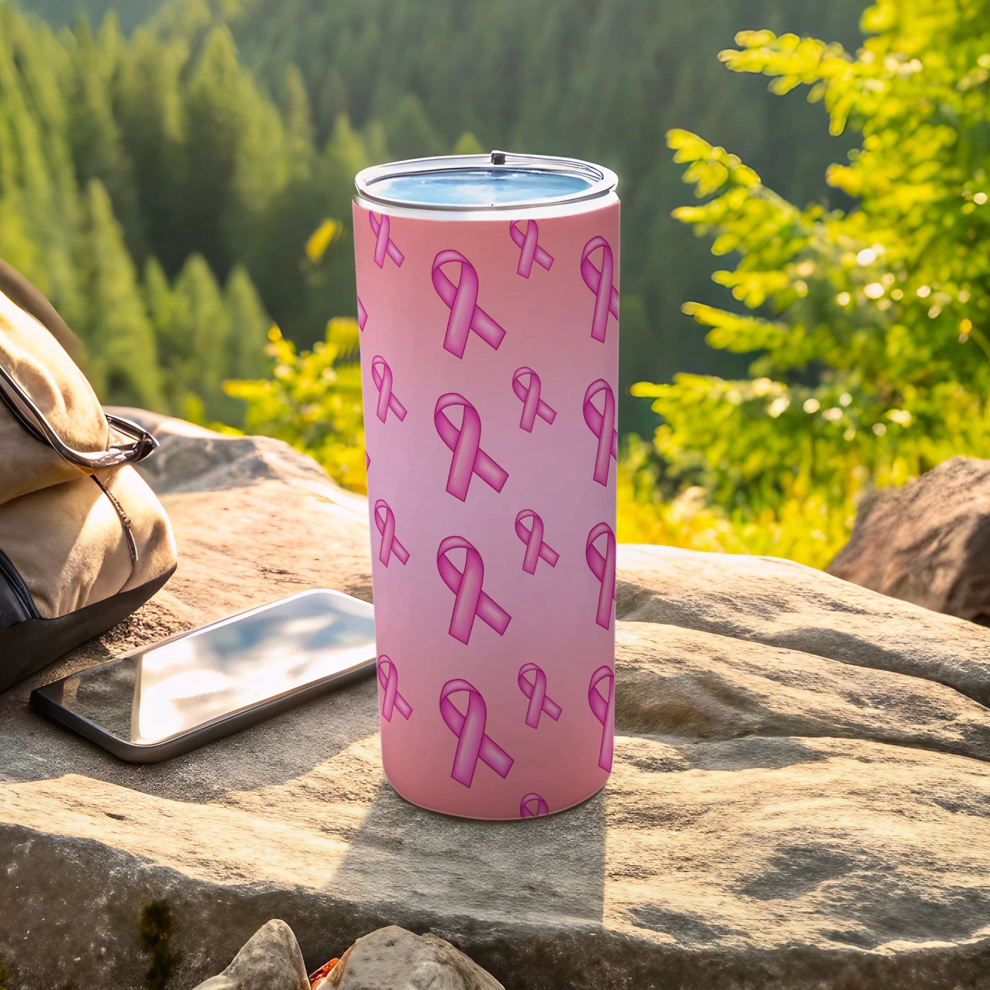 Pink gradient tumbler with repeating breast cancer ribbon pattern.