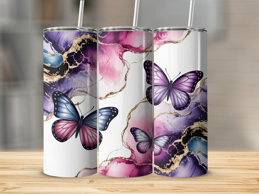Three tumblers with purple and pink marbled patterns and butterflies.
