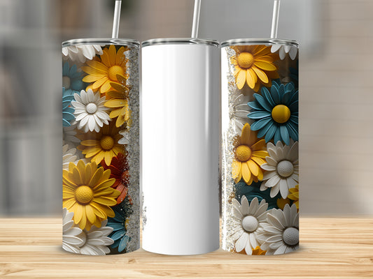 Three tall, cylindrical tumblers with a floral pattern of yellow, white, and teal daisies.