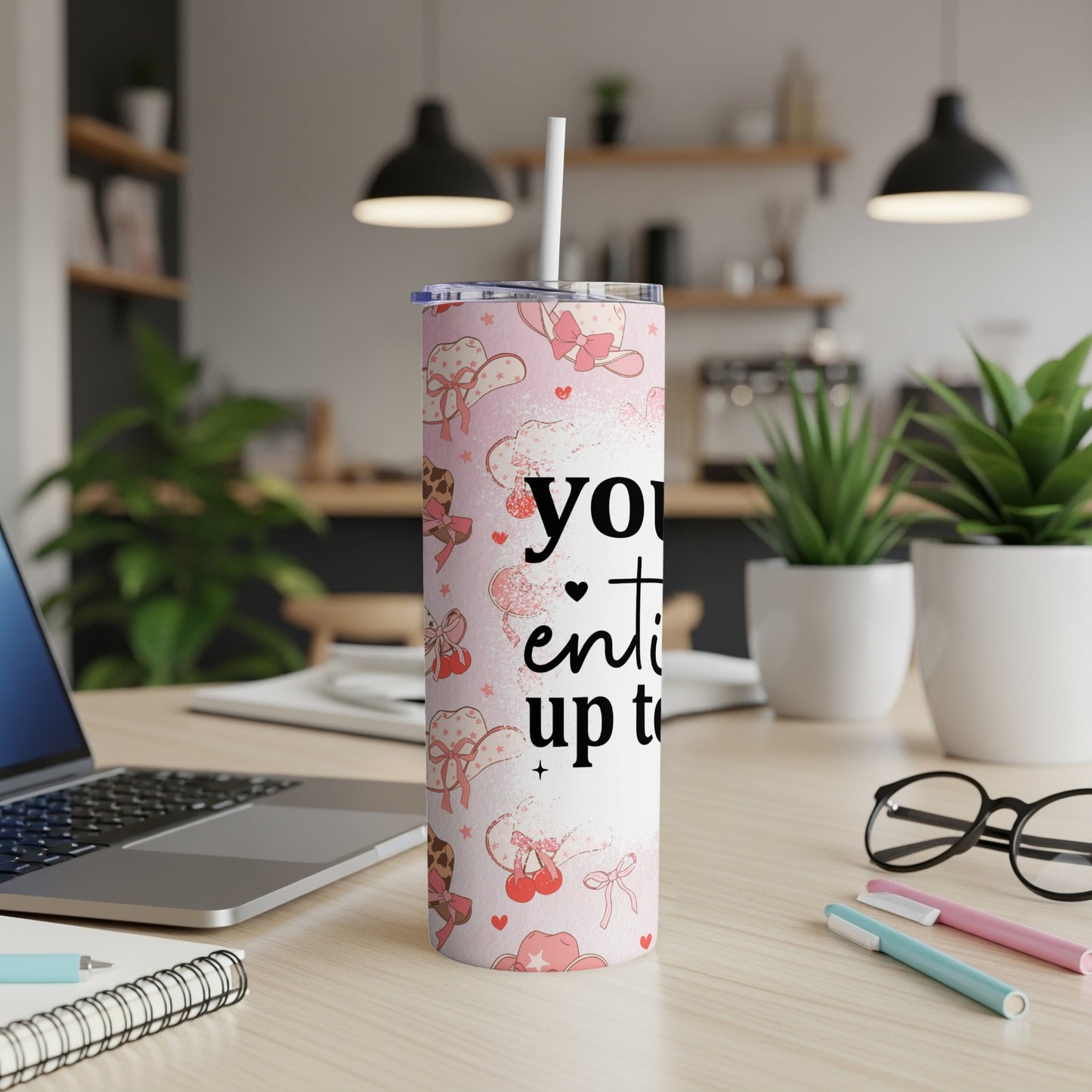 White tumbler with pink heart and cowboy hat pattern, text "you're the cutest up to".