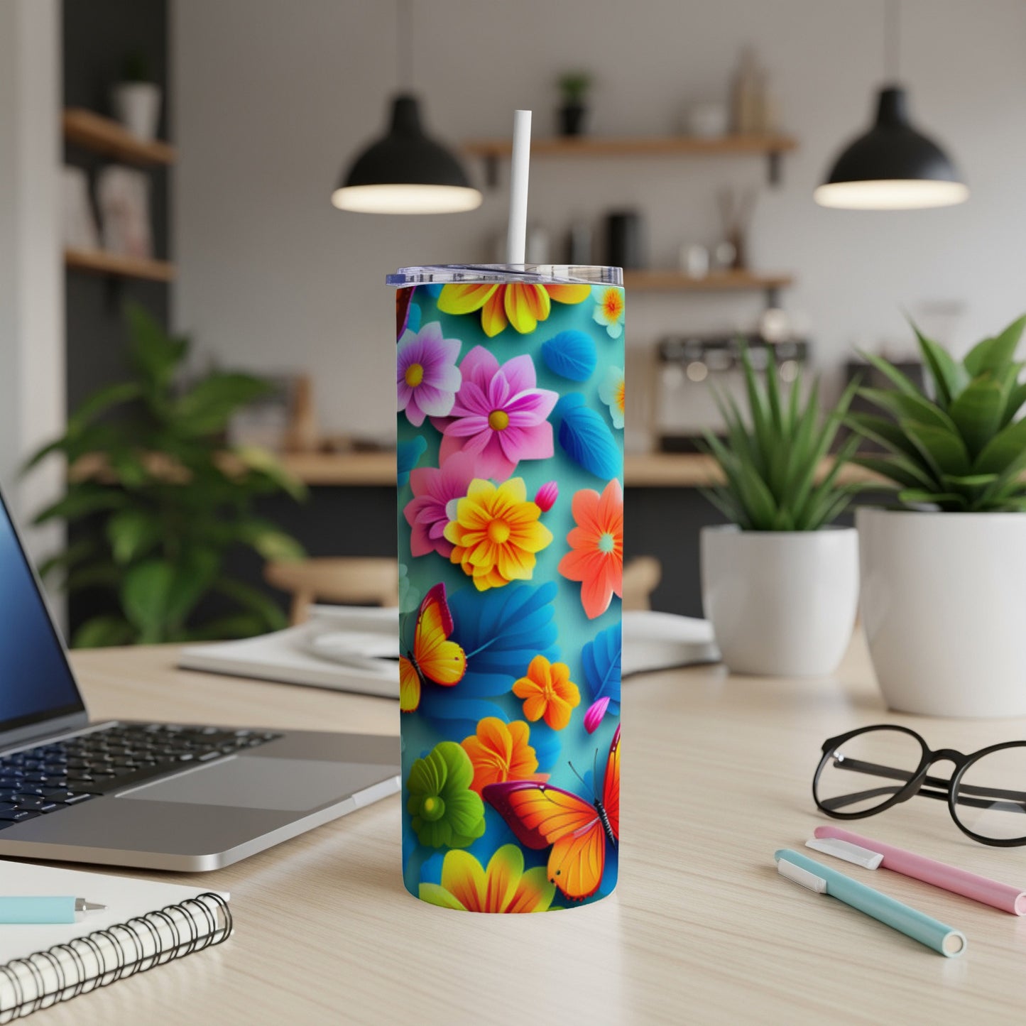 Tall tumbler with vibrant floral and butterfly design.