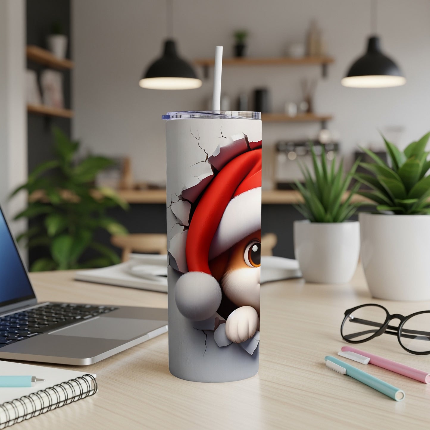 Christmas-themed tumbler with a cat wearing a Santa hat breaking through the design.