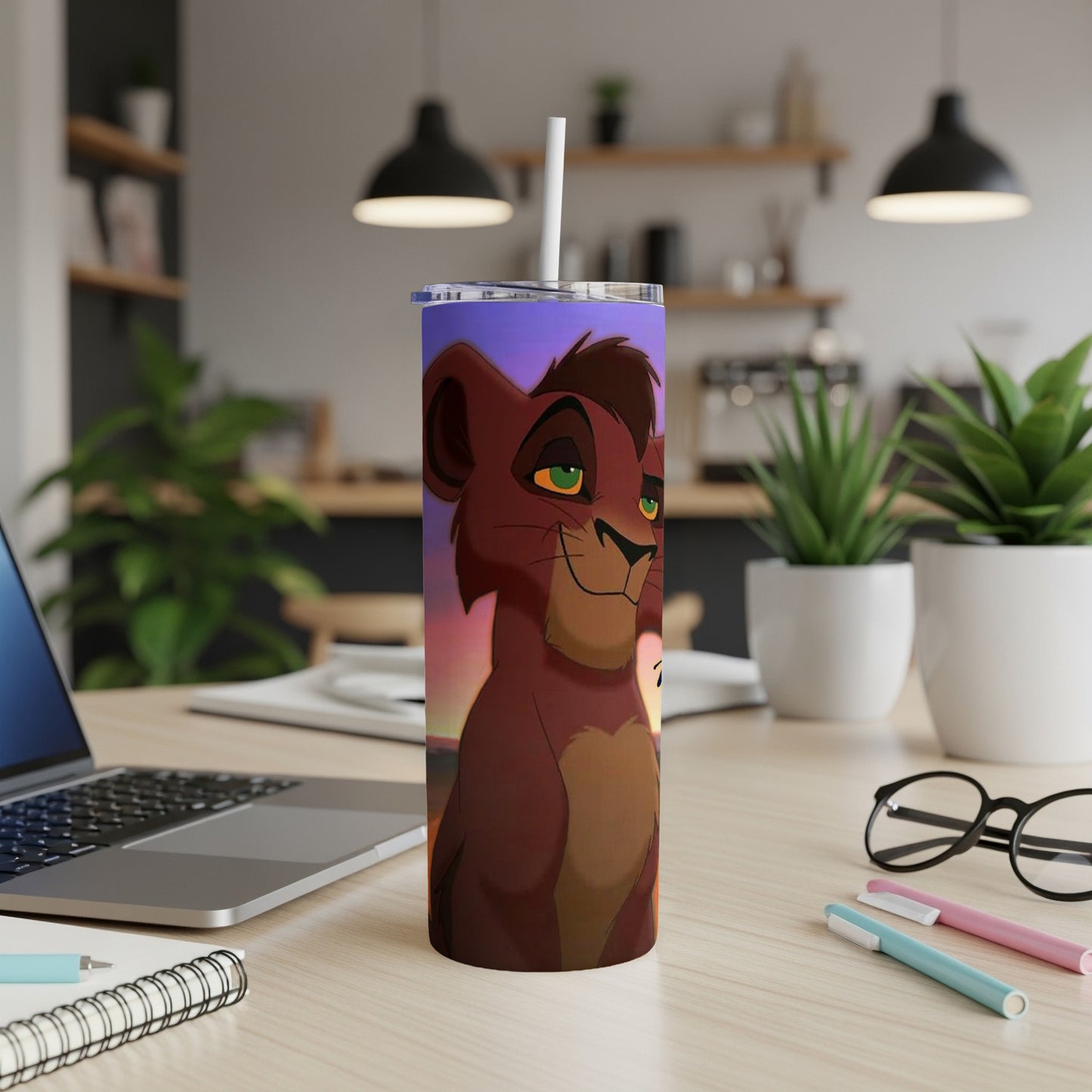Simba from The Lion King on a tumbler with a straw.