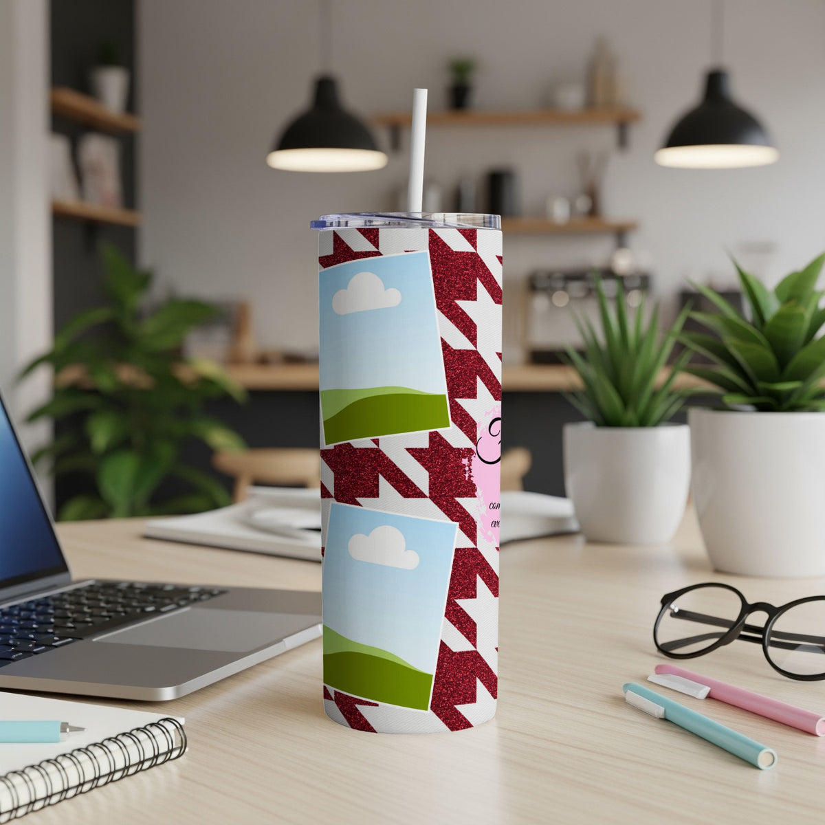 Tumbler with hounds tooth pattern and blank photo frames and a pink character.