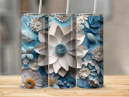 Three tumblers with intricate white and blue paper flowers.