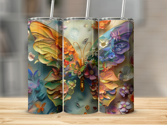 Three stainless steel tumblers featuring a colorful floral butterfly design.