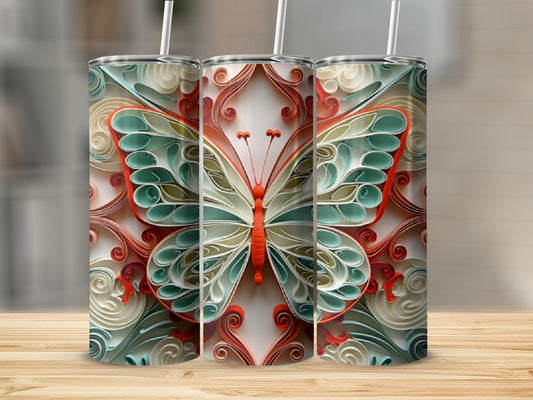 Three tumblers featuring a colorful butterfly with intricate scrollwork.