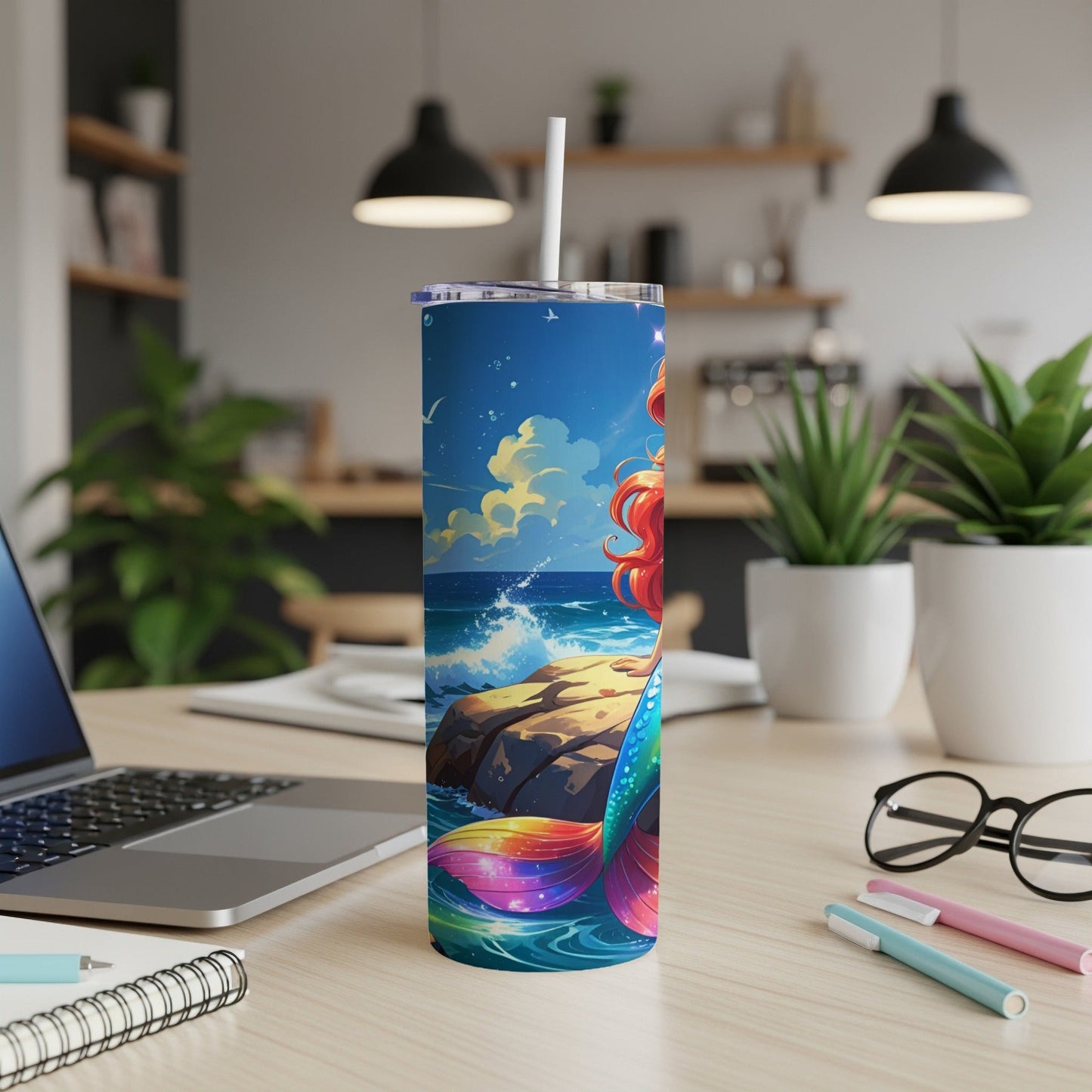 Colorful mermaid on a tumbler with waves and clouds.