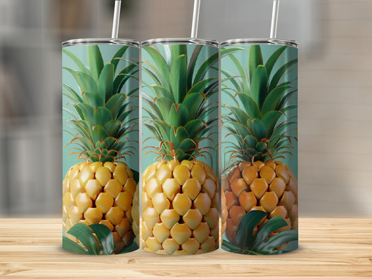 Three tumblers with a pineapple and leaf design on a wooden surface.