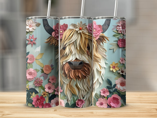 Highland cow tumbler with floral accents.