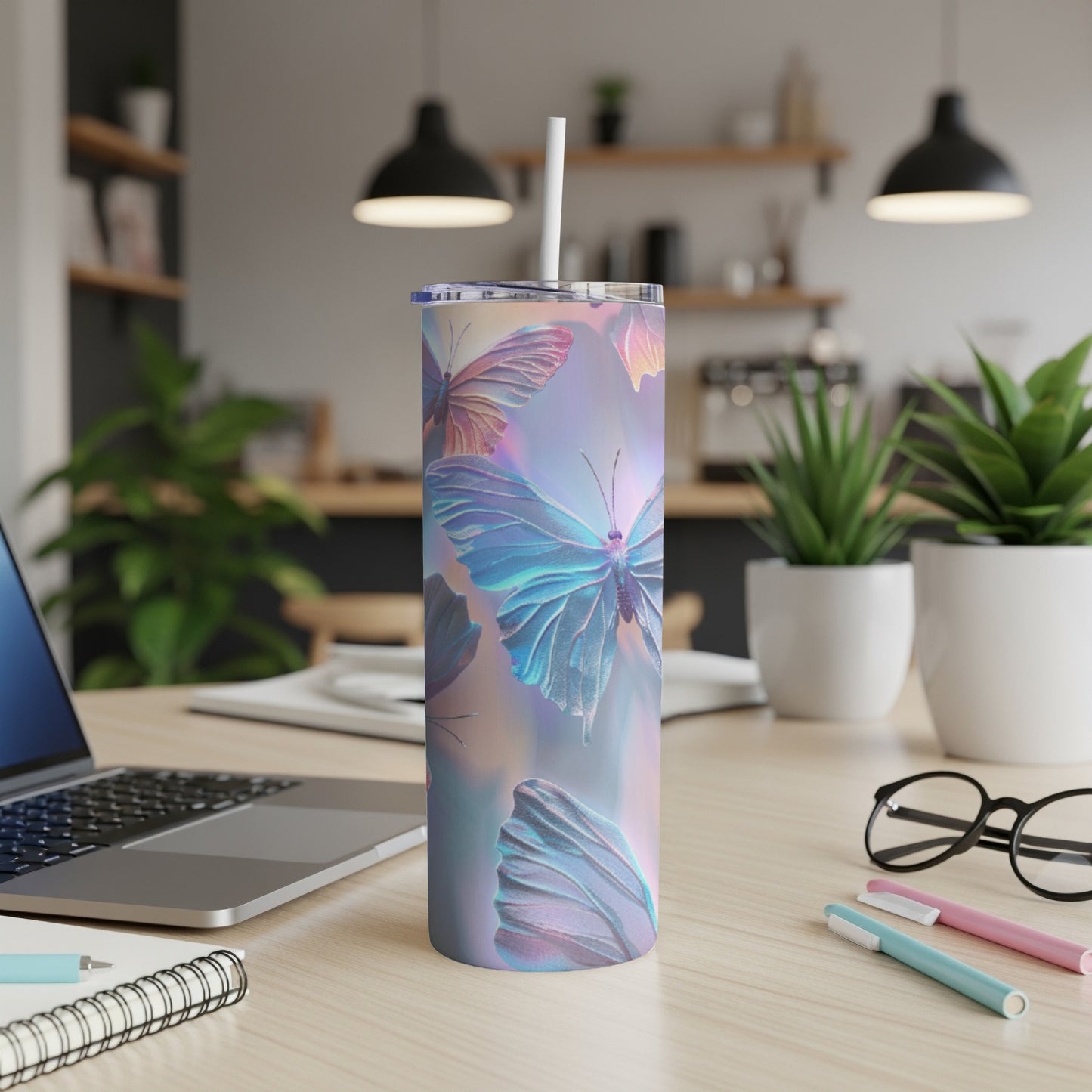 Iridescent butterflies on a pastel gradient tumbler with a straw.