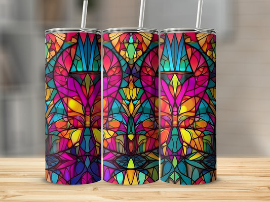 Three tumblers with vibrant stained glass floral patterns.