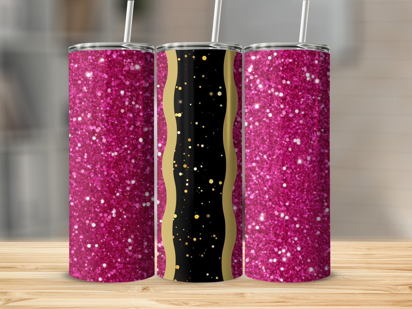 Three glittery pink tumblers with gold accents on a wooden surface.