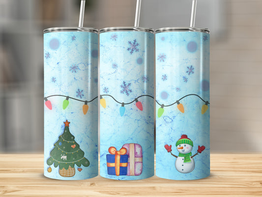 Blue tumbler with Christmas tree, gift, and snowman design.
