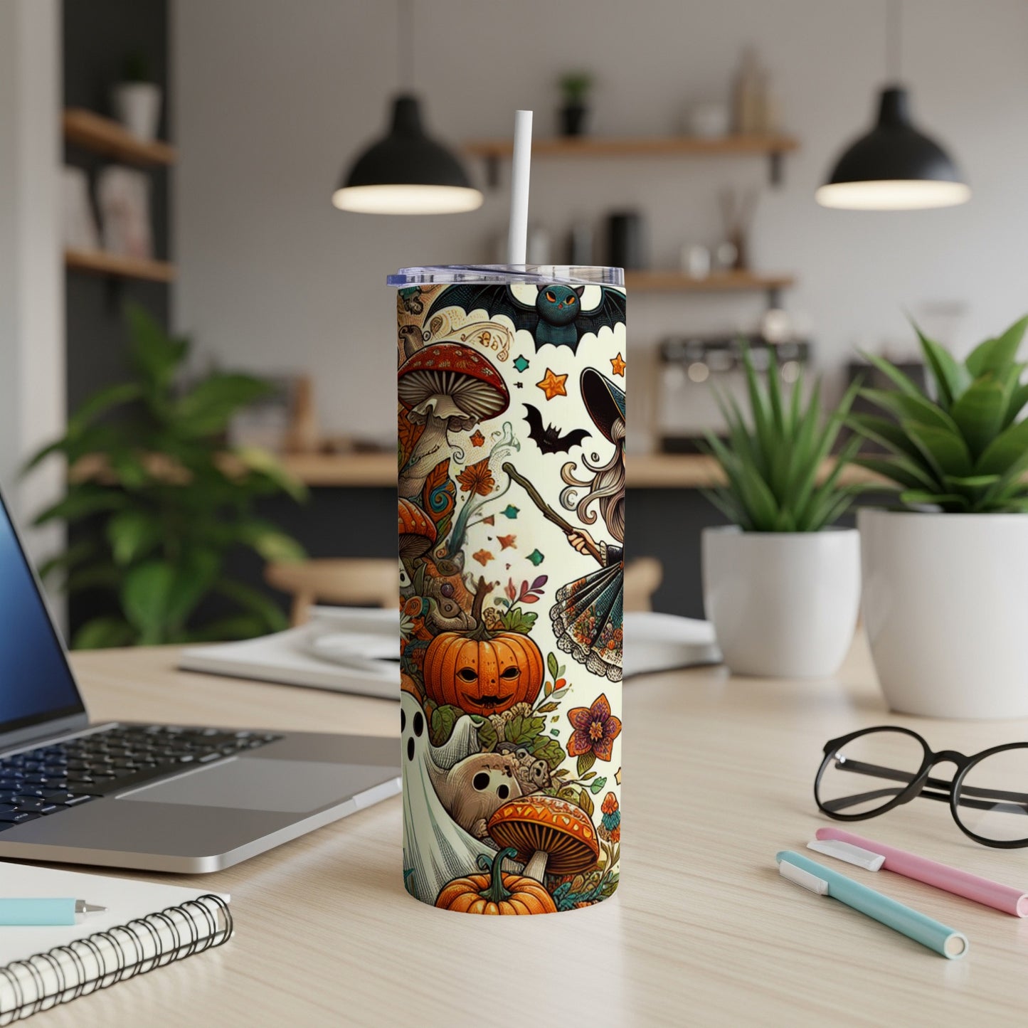 Halloween tumbler with witches, bats, pumpkins, ghosts, and mushrooms.