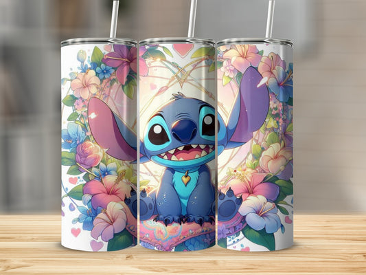 Adorable Blue Alien Surrounded by Colorful Flowers Tumbler