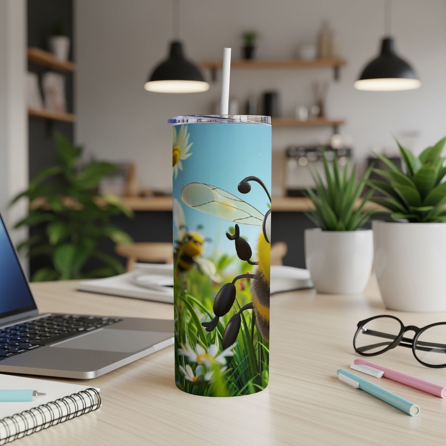 Cartoon bee on a grassy field with daisies, on a tumbler.