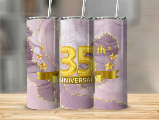 Triptych of 35th Anniversary tumblers with gold stars and banner on marble background.