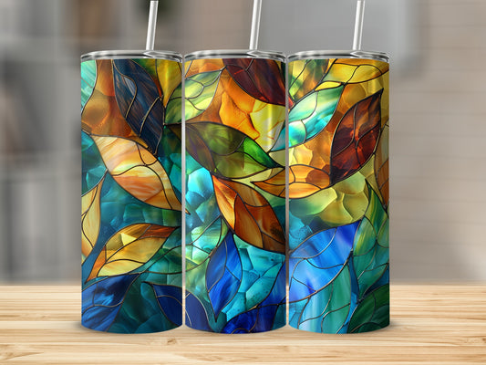 Three tumblers with stained glass leaf pattern in blue, green, and amber.