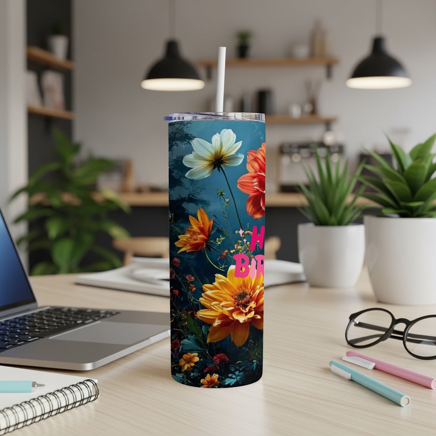 Tall tumbler with floral design and "Happy Birthday" text.
