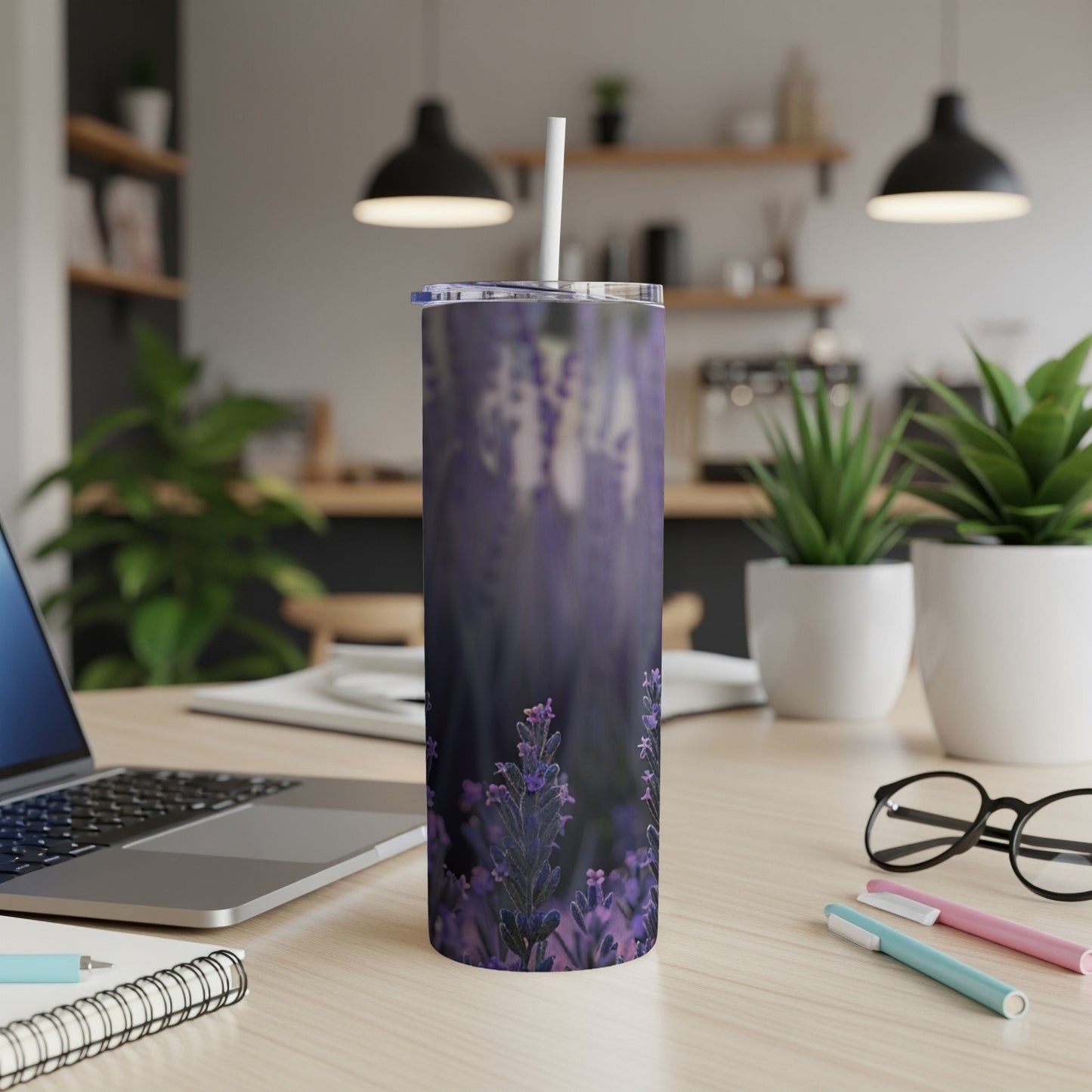 Purple lavender flowers on a skinny tumbler with a straw.