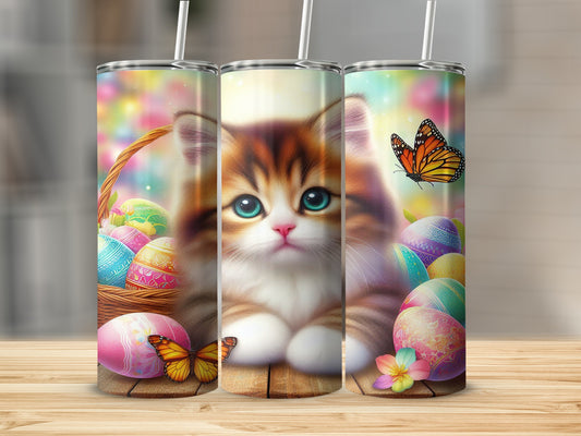 Fluffy kitten with blue eyes surrounded by Easter eggs and butterflies.