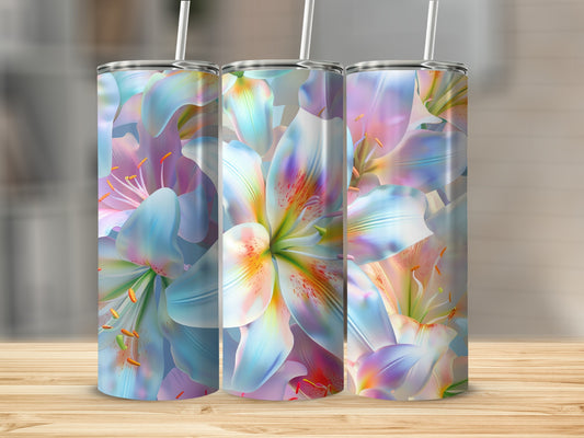 Three tumblers with a pastel lily floral pattern on a wooden surface.
