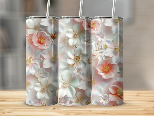 Three tumblers with a floral design featuring light pink and white flowers.