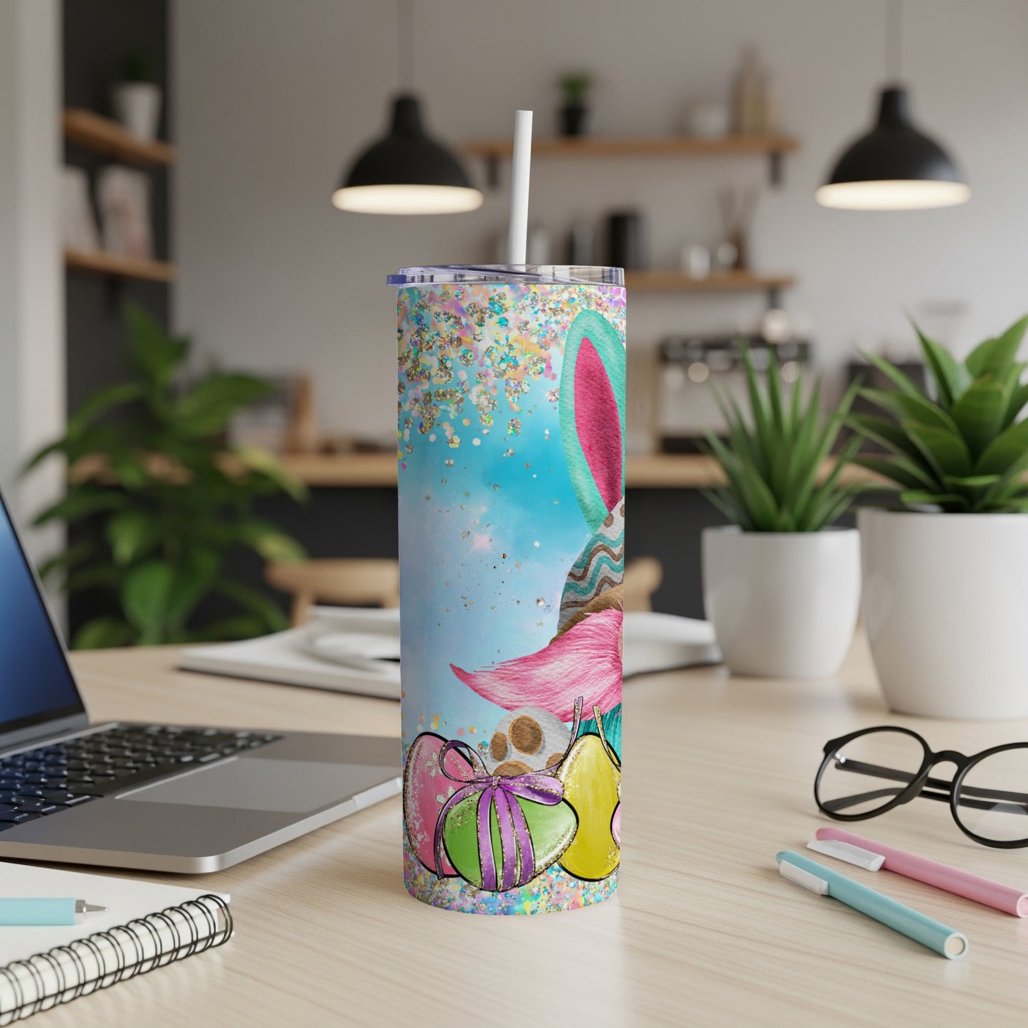 Easter bunny tumbler with colorful eggs and confetti.