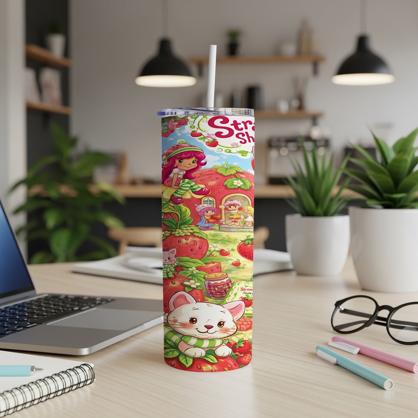 Strawberry Shortcake tumbler with a white straw, featuring characters and strawberries.