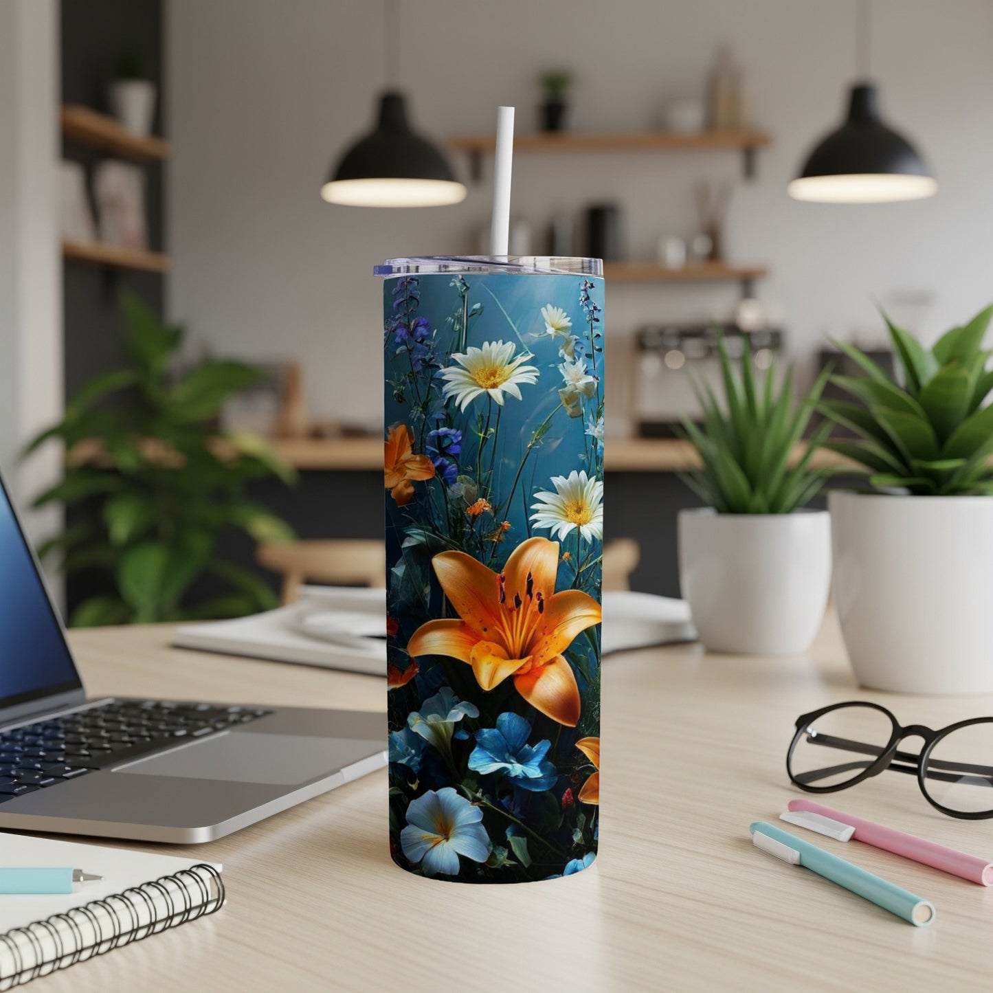 Tall tumbler with a vibrant floral design featuring lilies and daisies.