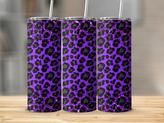 Purple tumbler with black leopard print and straw.