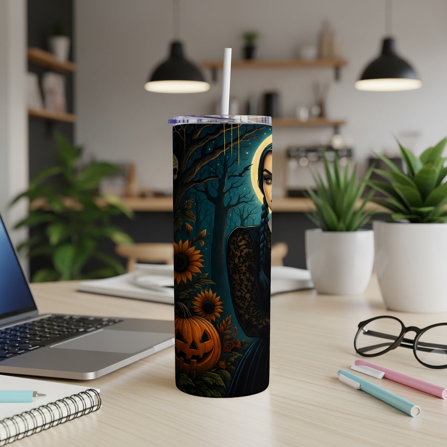 Tumbler with spooky Halloween art featuring a character, pumpkin, and sunflowers.