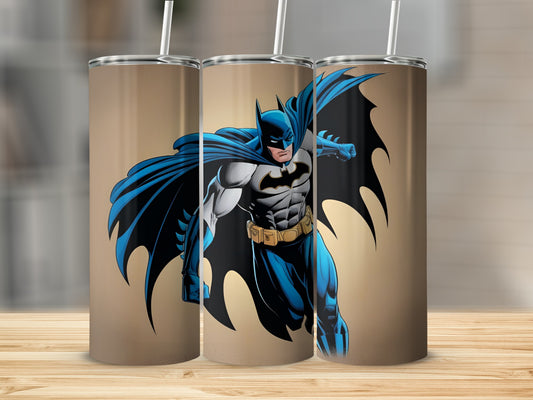 Batman in dynamic pose with blue and grey costume on a tumbler.
