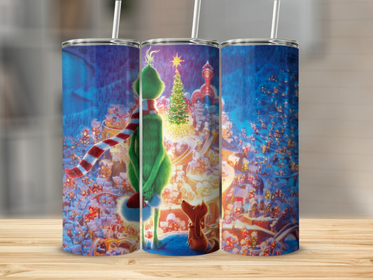 The Grinch and Max in Whoville on a Christmas tumbler.