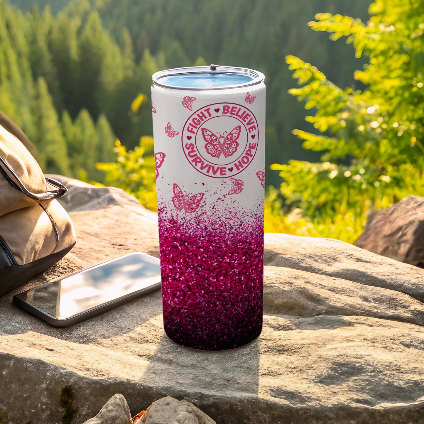 Pink glitter tumbler with butterfly and ribbon design with text "Fight. Believe. Survive. Hope."