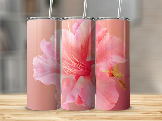 Three tumblers with a close-up pink floral design on a wooden surface.