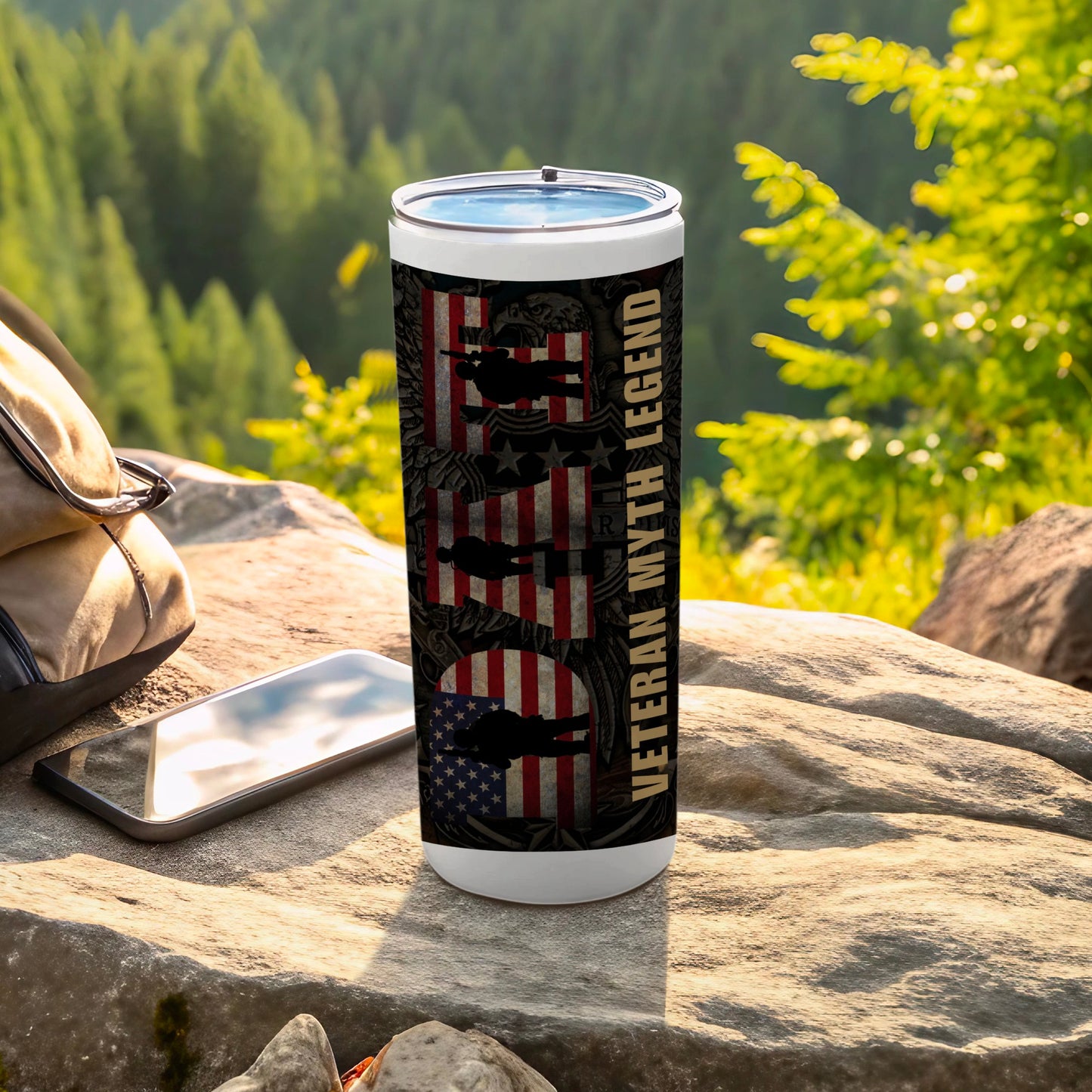 White tumbler with "Veteran Myth Legend" and American flag silhouettes.