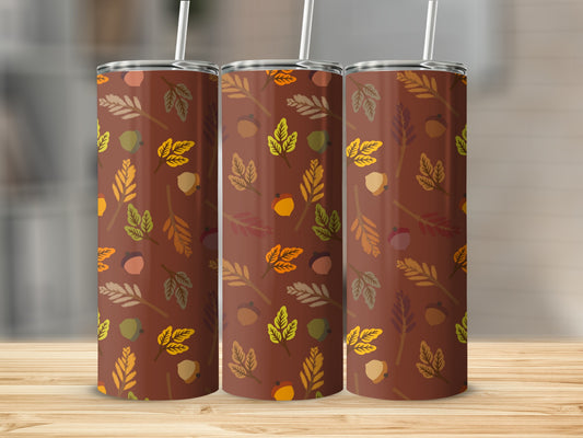 Brown tumbler with all-over pattern of acorns and autumn leaves.