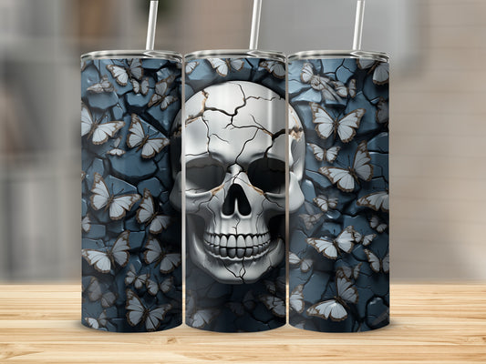 Three tumblers featuring a cracked skull and white butterflies on a gray background.