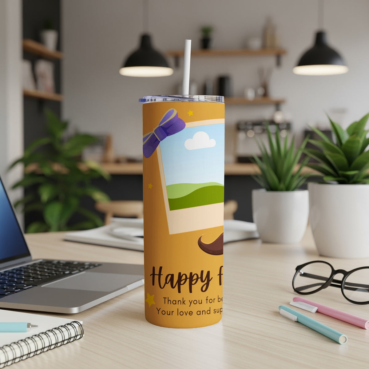 Orange tumbler with "Happy f" text, a photo frame, and mustache graphic.