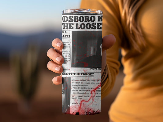 Newsprint design with horror theme tumbler cup